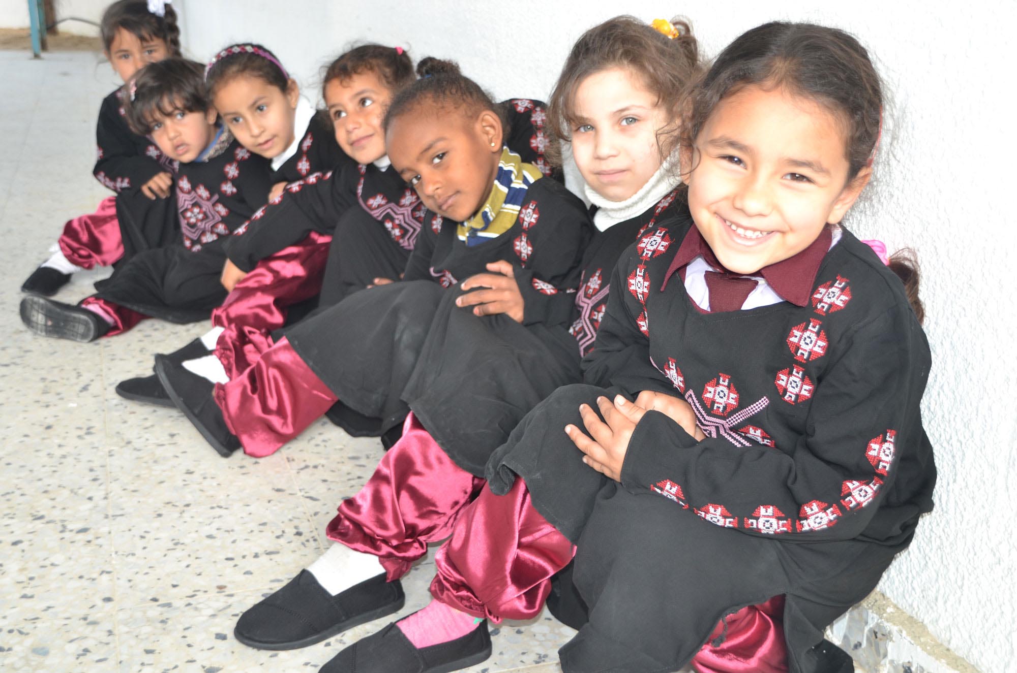 Gaza preschoolers celebrated the delivery of TOMS shoes by wearing traditional Palestinian clothes and performing folk dances wearing their new shoes.