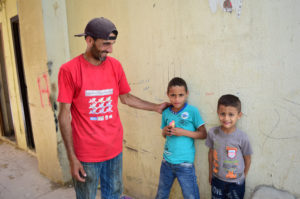A refugee camp recycling project helps Ayman make ends meet for his family.