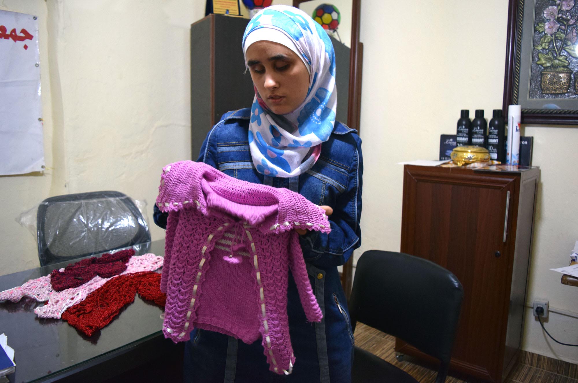 Syrian refugee education courses in sewing and knitting help teens learn job skills.