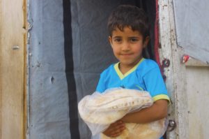 Ramadan food parcels help refugee families celebrate.