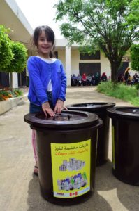 Nahr El Bared girl joins in solid waste management project.