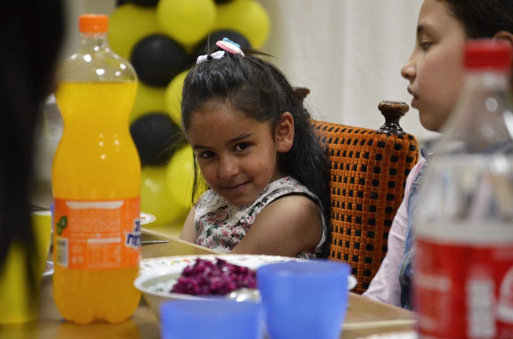 Palestinian girls have a spaghetti dinner at the Dar Al-Tifl school for orphans in East Jerusalem.