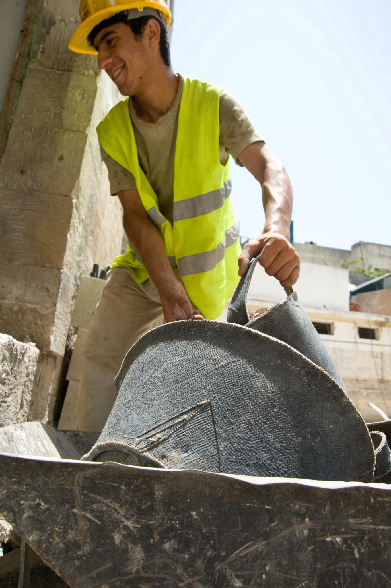 Anera contractors remove rubble from the Fatmeh Khatoon Basic Girls School in the city of Jenin.