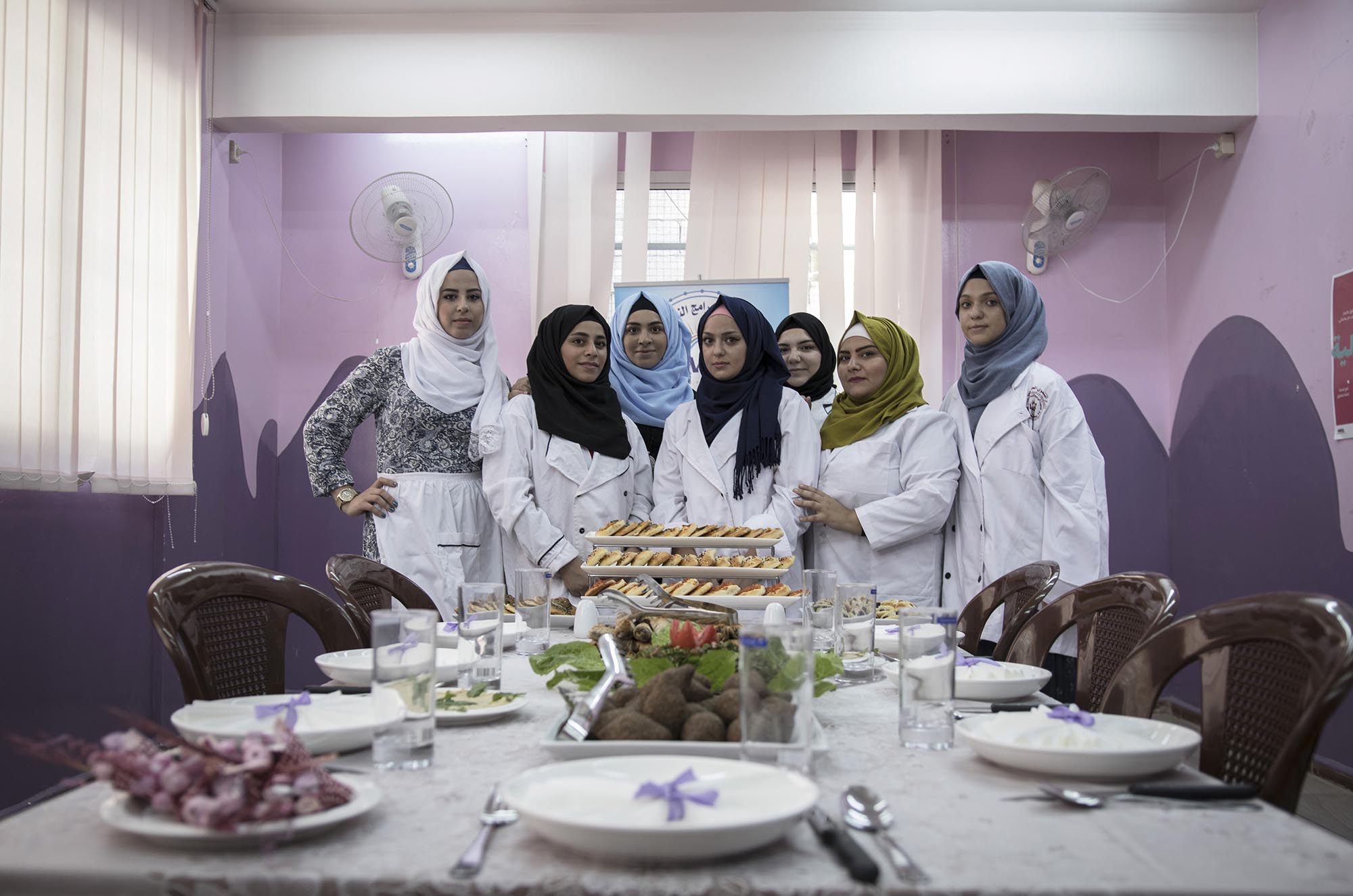 Young women enrolled in Anera's cooking courses in Lebanon.