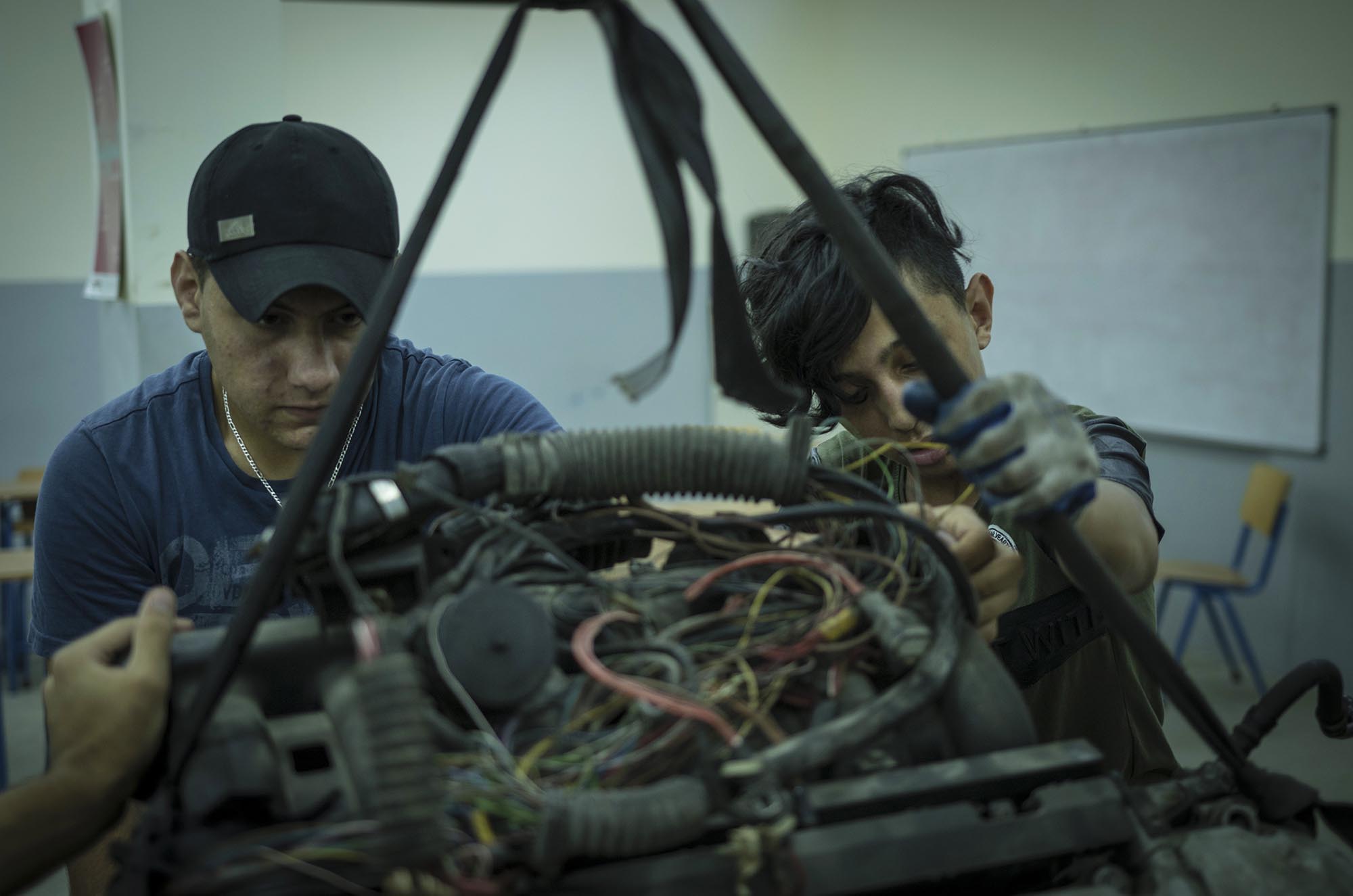 Young men enroll in Anera's mechanics courses for refugee youth in Lebanon.