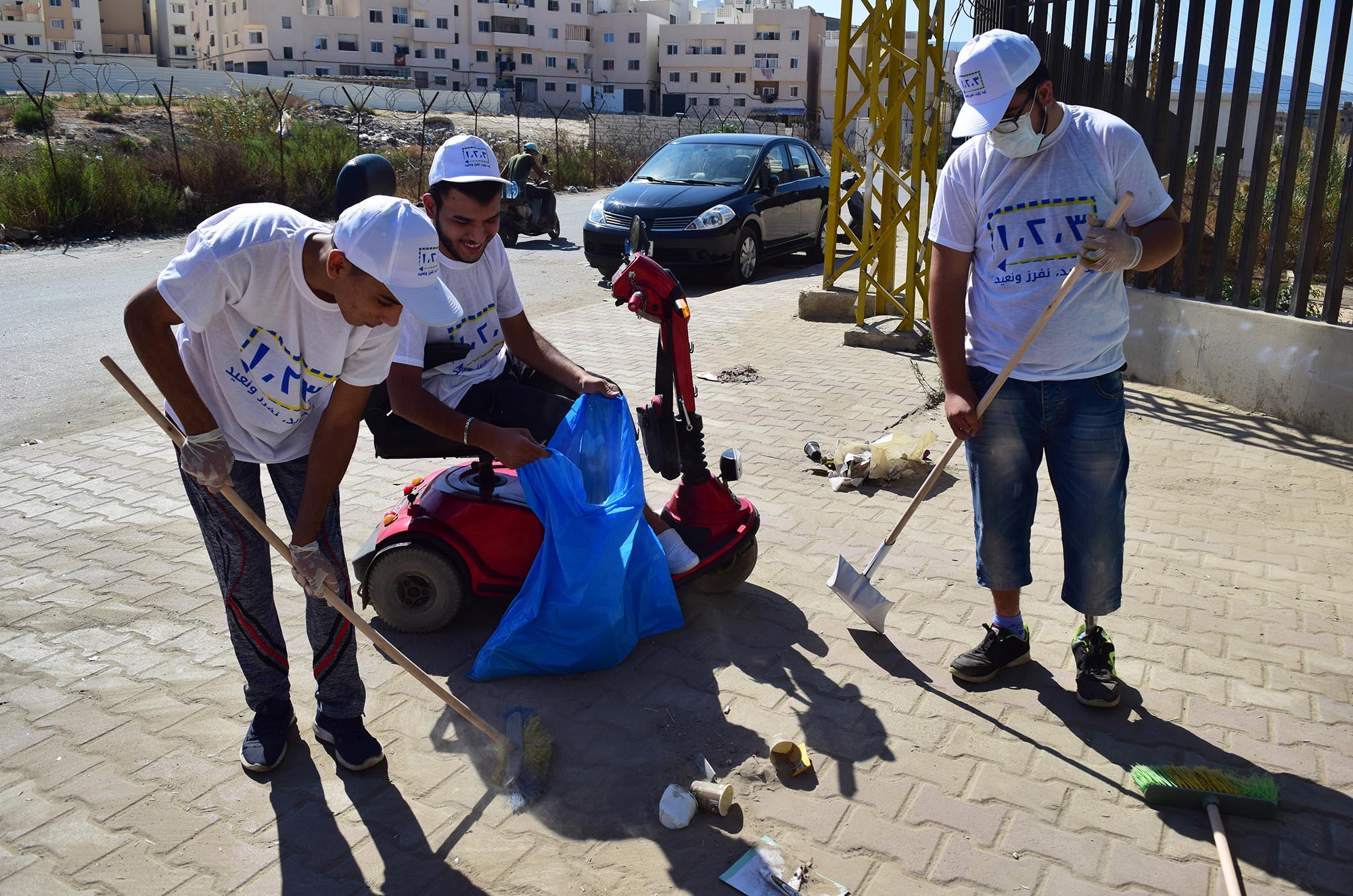Refugee youth participate in Anera's solid waste management project in Lebanon.
