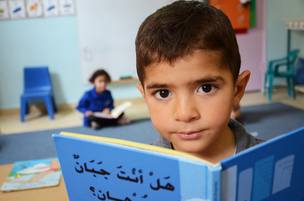 A kindergarten boy in Qalandia refugee camp, West Bank.