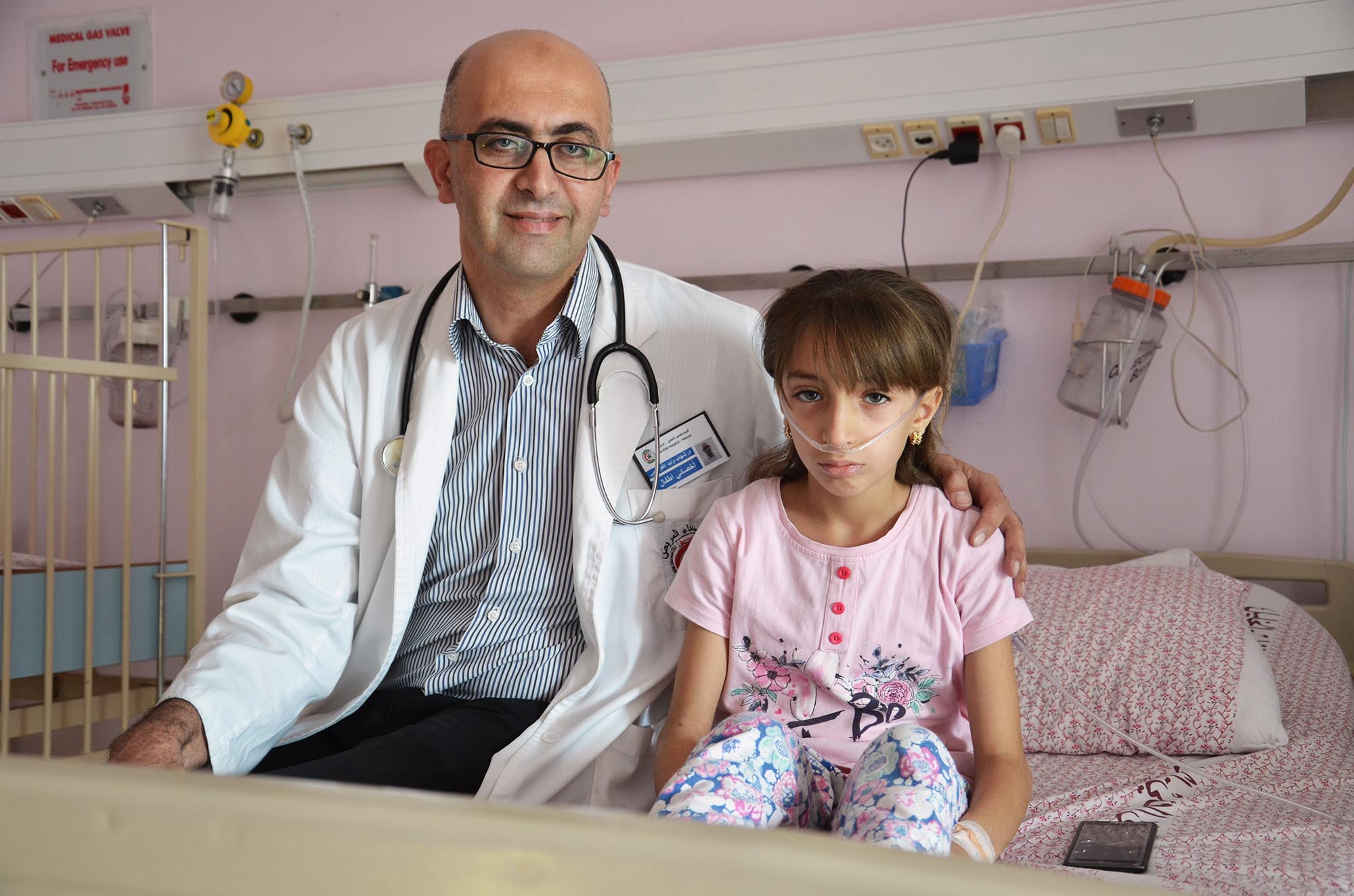 Dr. Qawasmi knows first-hand the turbulent feelings of having a child fall ill.