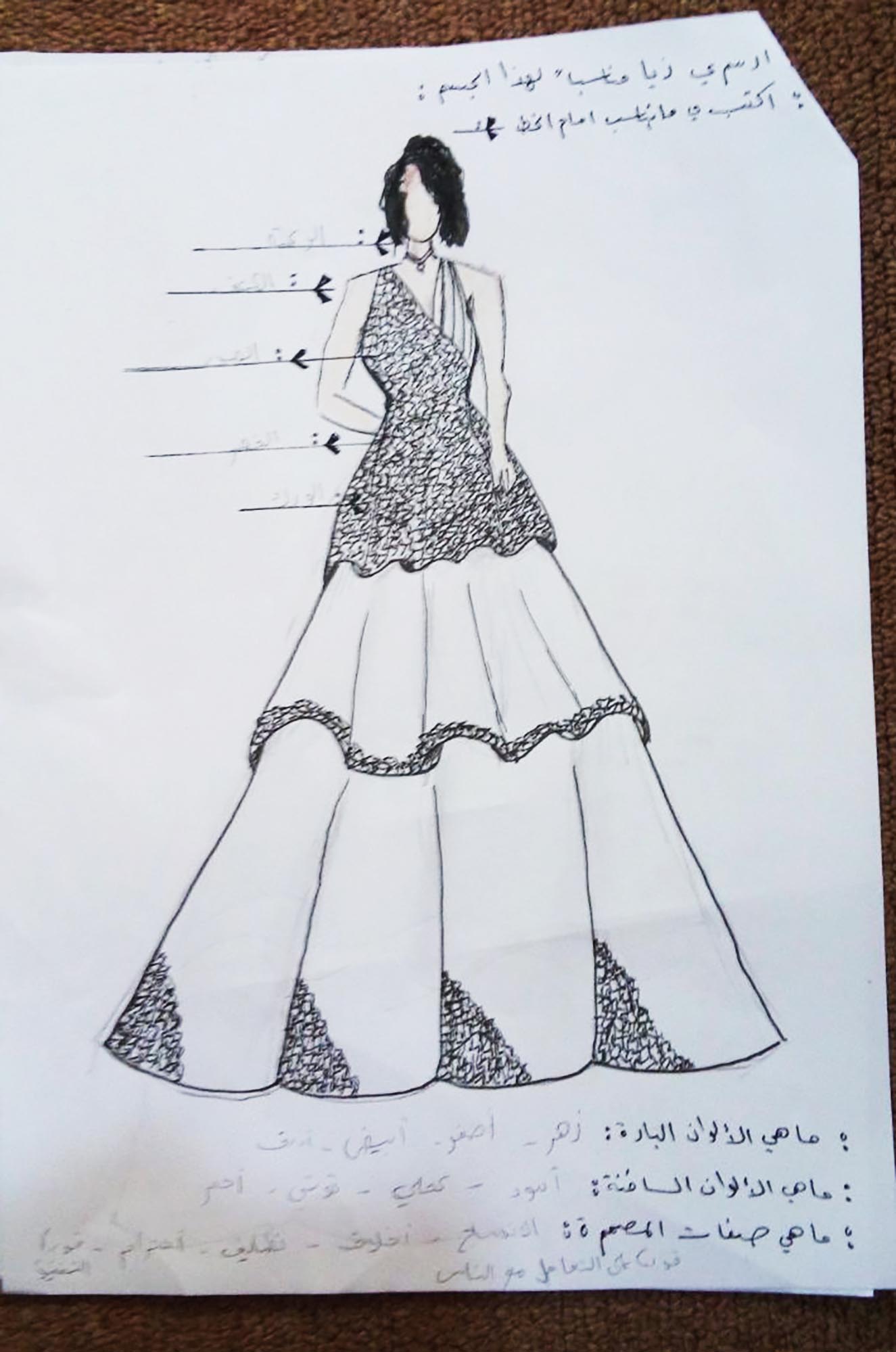 Aya sketches a dress as part of her internship with a local seamstress.