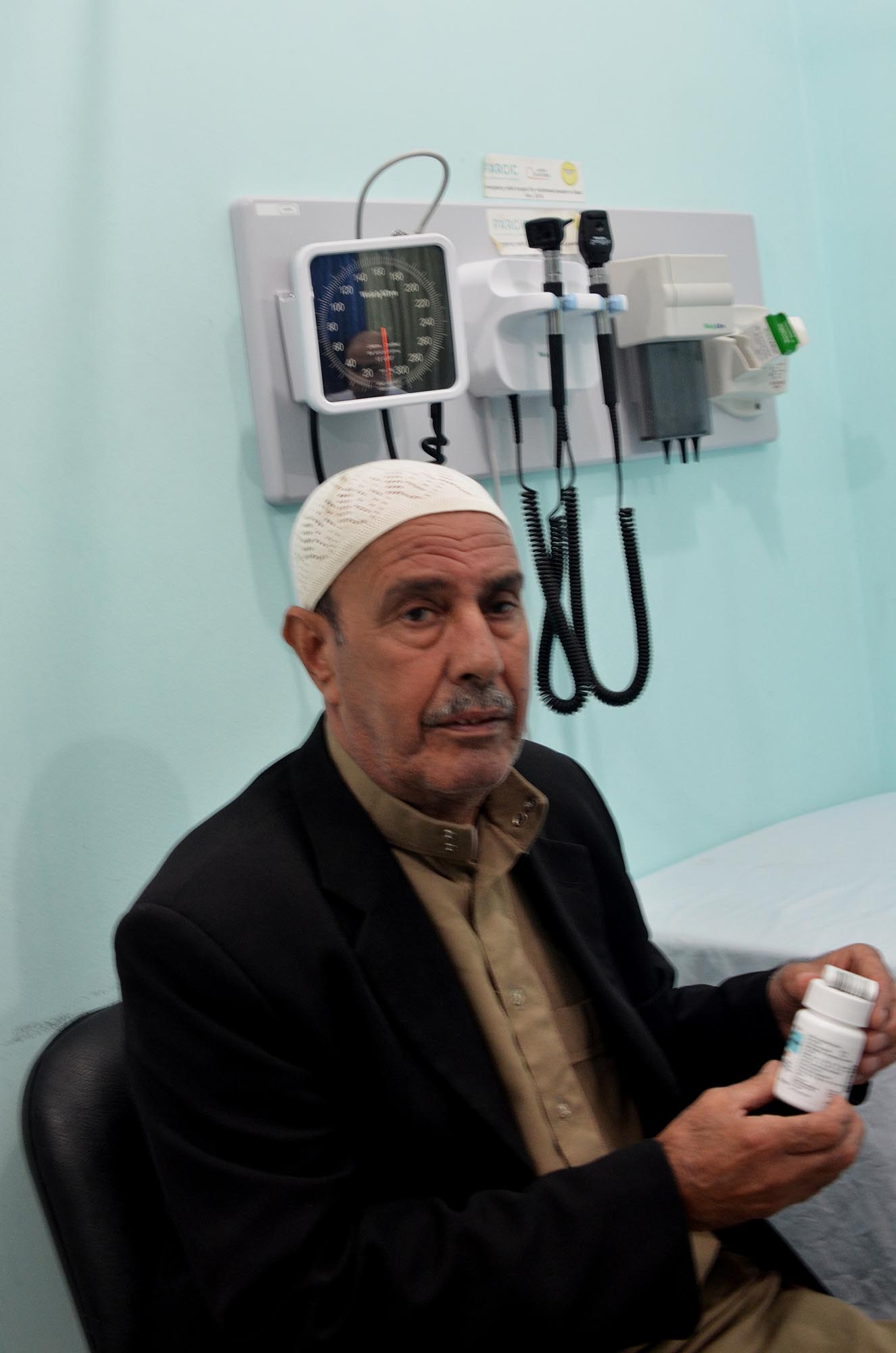 Abu Ibrahim receives his medicines in Gaza.