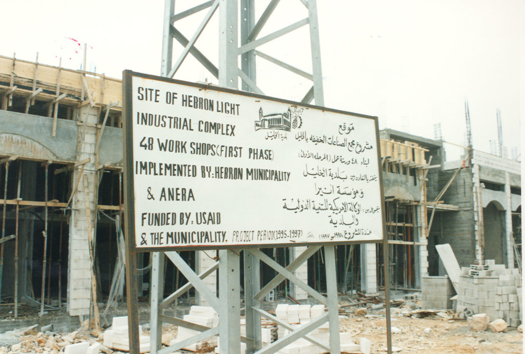 Sign at Anera's Hebron Industrial Complex construction site