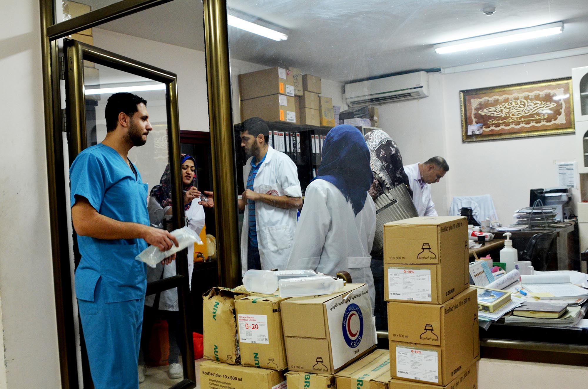 Al Quds Hospital receives a shipment of saline solution - an essential item. 