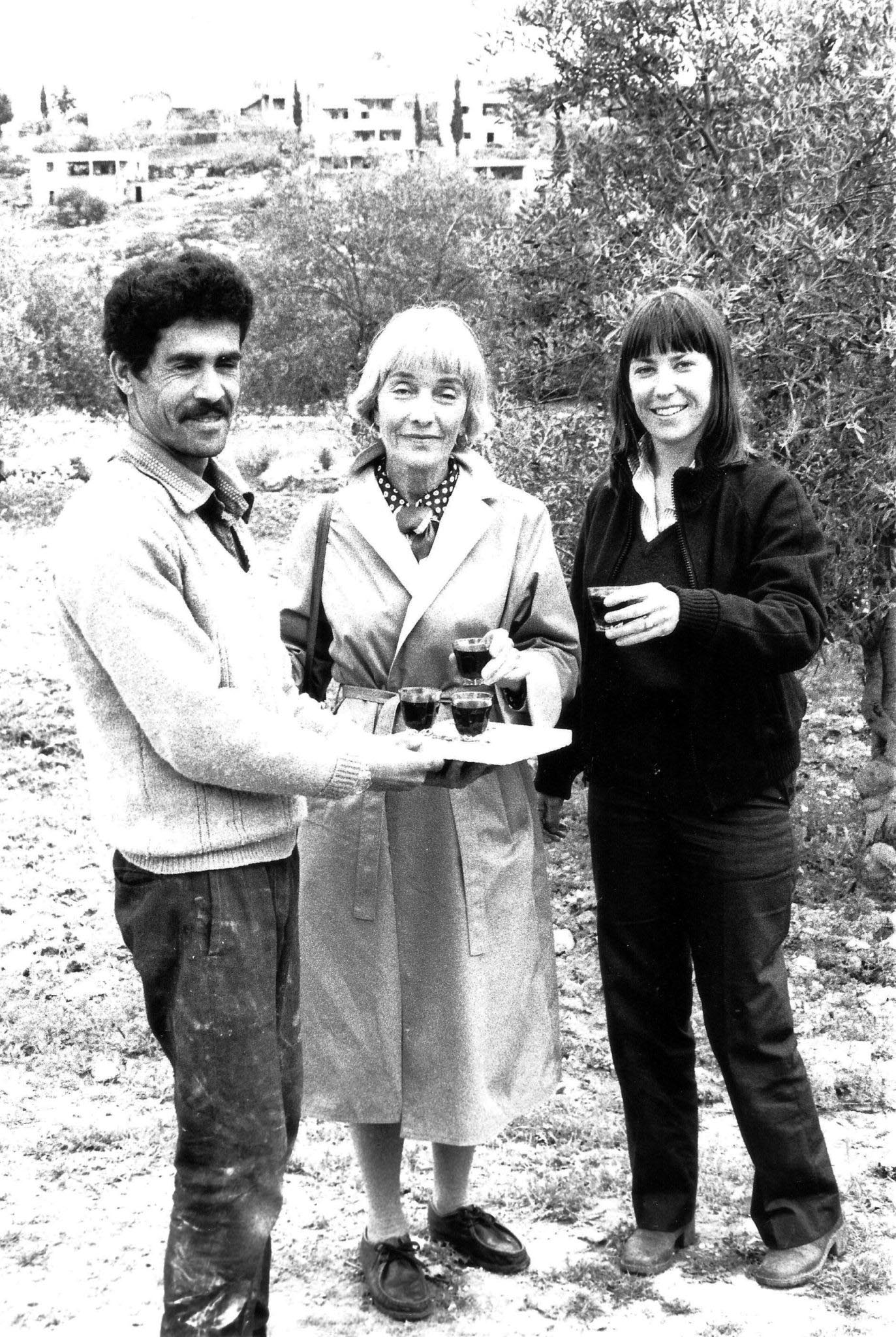 Beit Jala Olive Press Co-op members serving tea to my mother, Nancy Svien, and me.