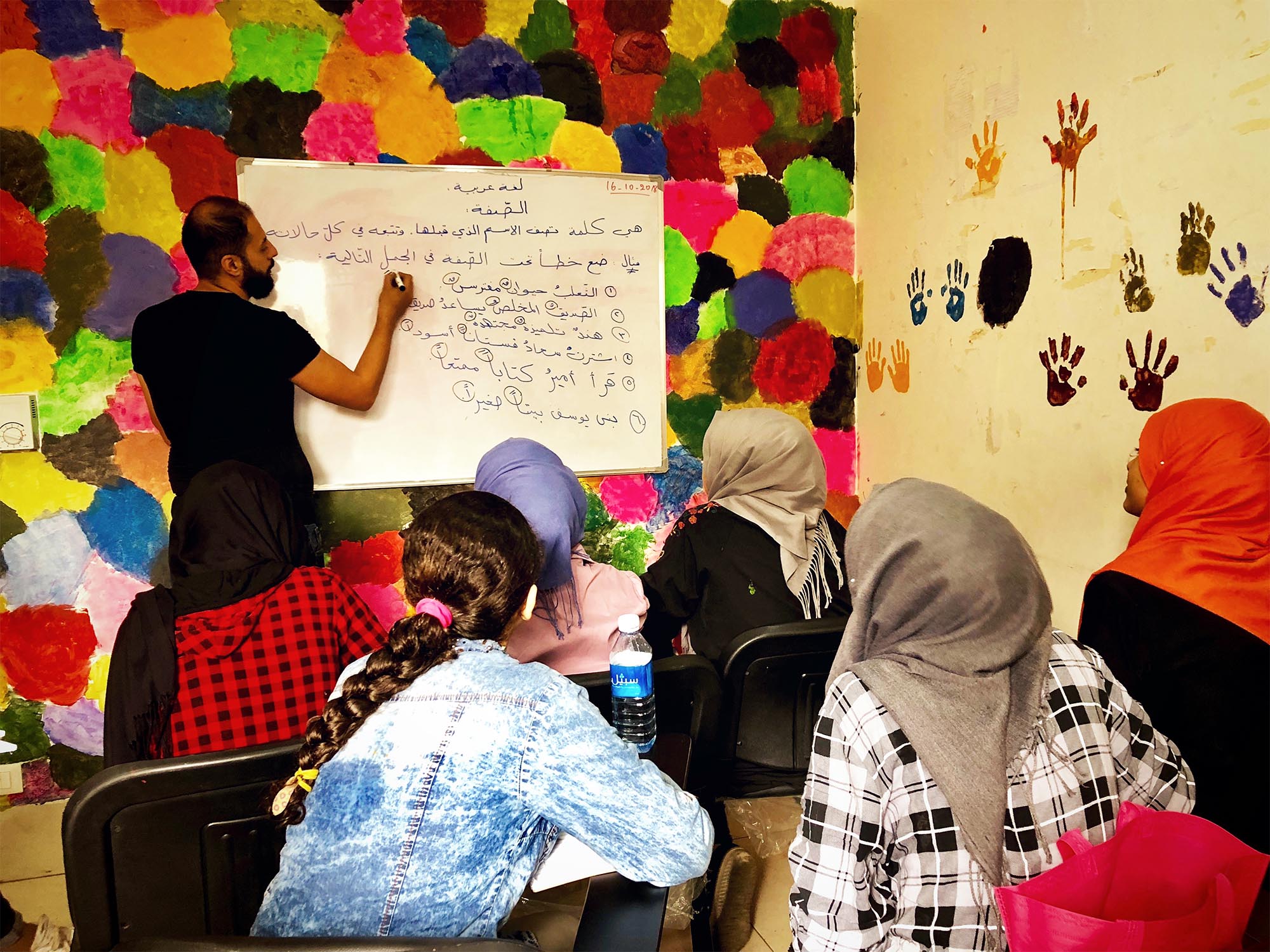 Refugees, whose schooling was put on hold, learn Arabic in Burj El Burajneh.