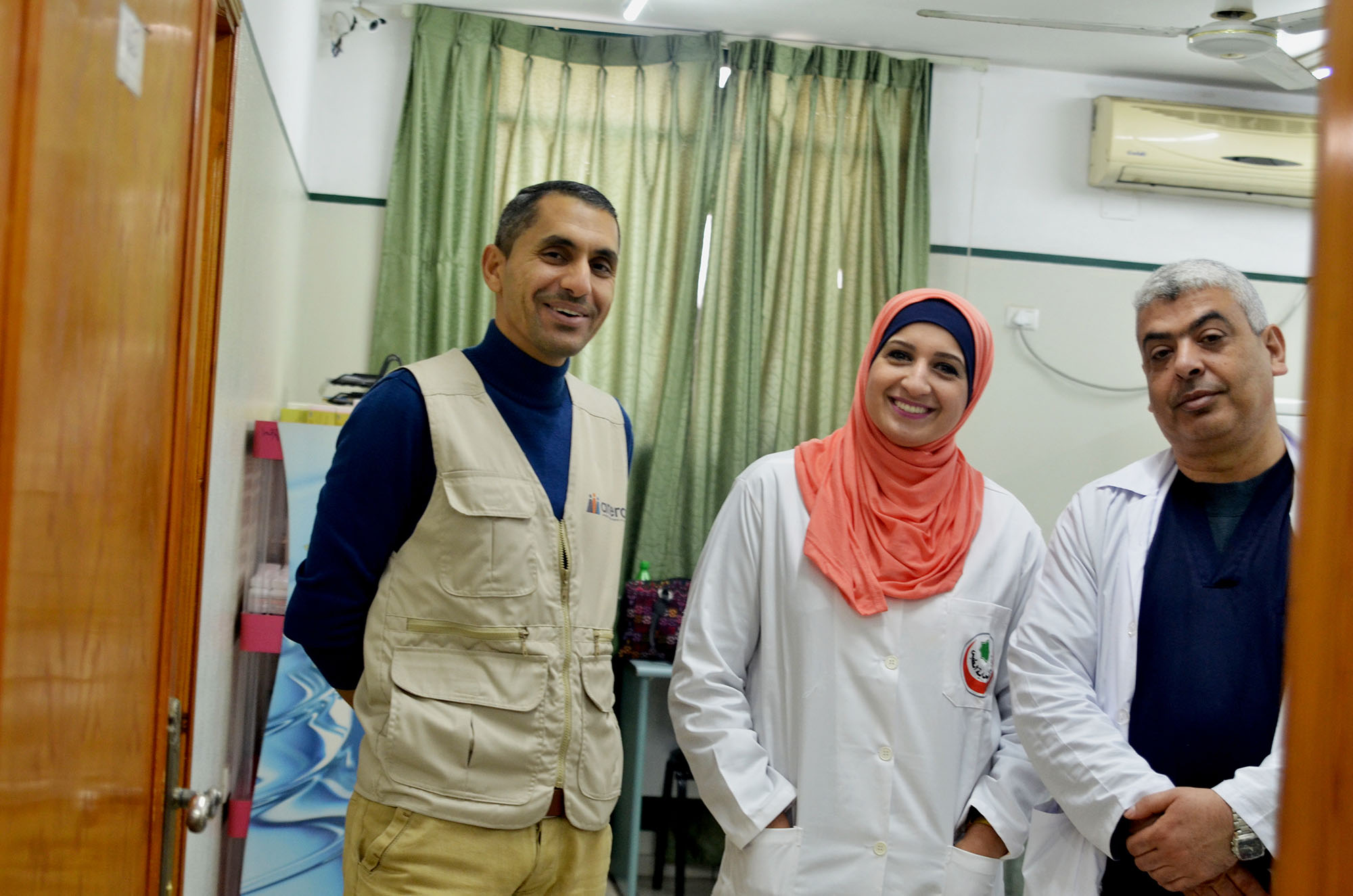 Anera staff with pharmacist Hind Abu Jahal and obstetrician Dr. Ziyad Siam at Al Sahaba in Gaza.