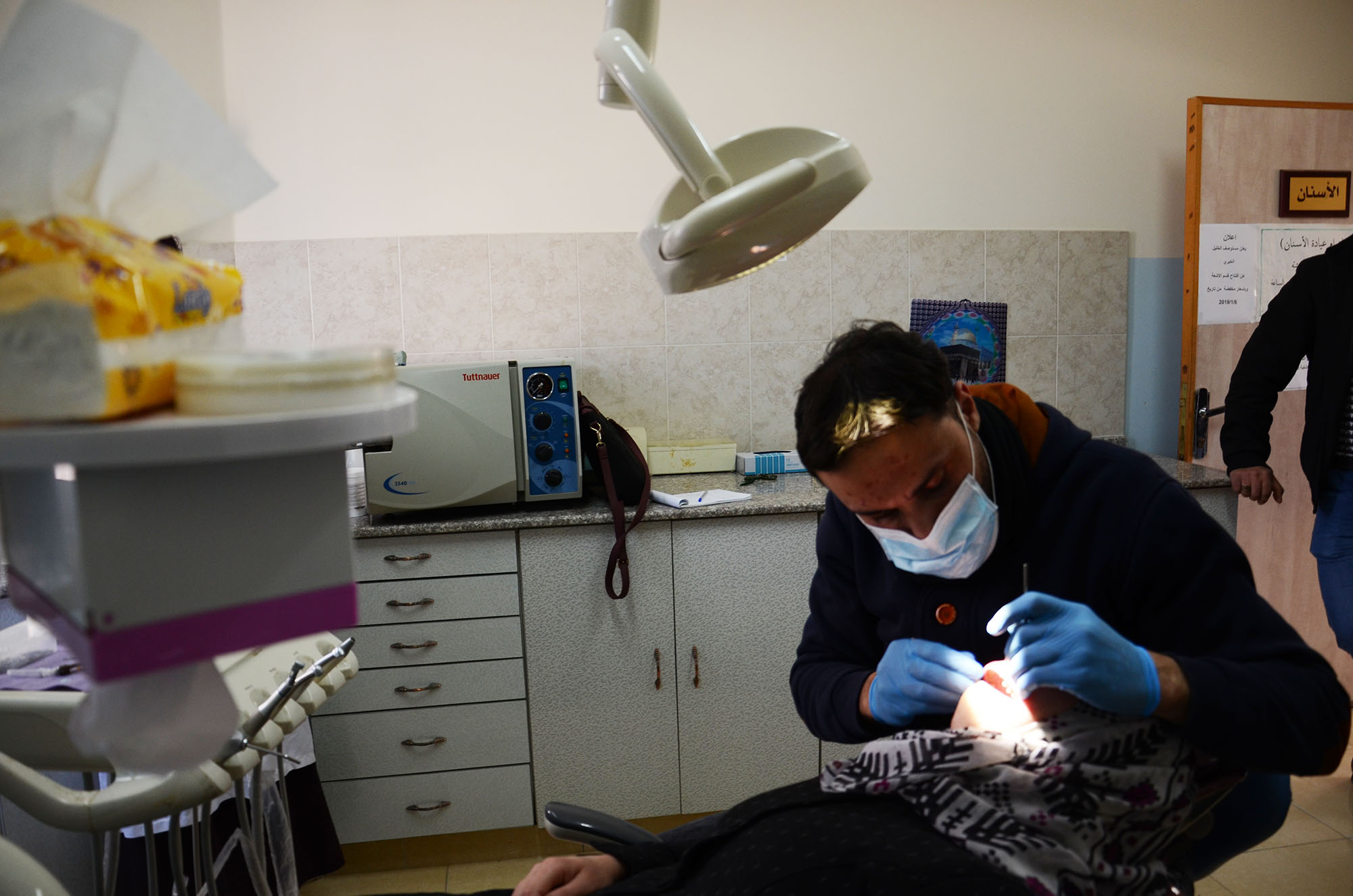 Samia being examined by the dentist.