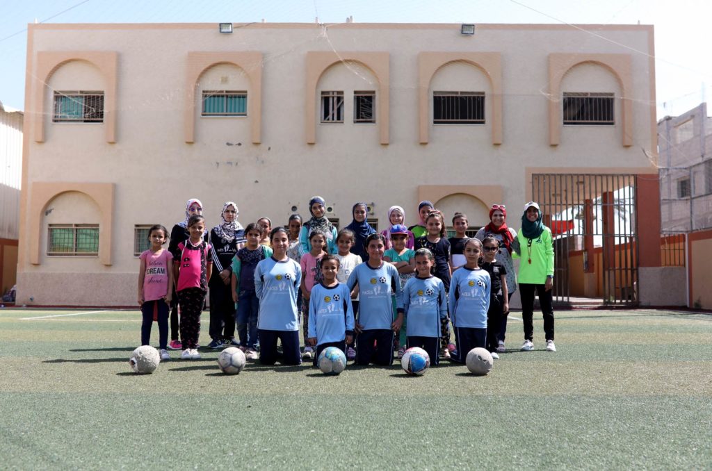 Musaddar, girls, soccer, Gaza, PCID, sports Musaddar girls team in front of their Sports Club facility