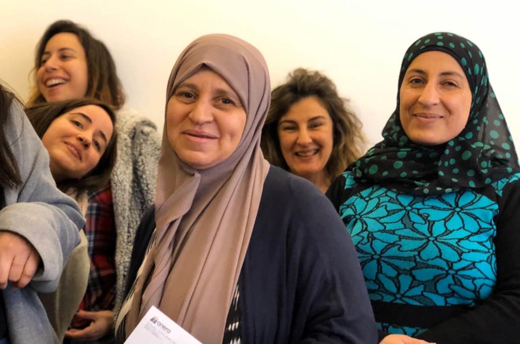 Rahma with some of the Anera - Lebanon staff behind her.
