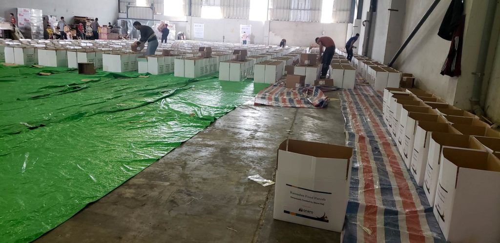 Mona Hajj Ramadan 2020 food parcel assembly in a warehouse