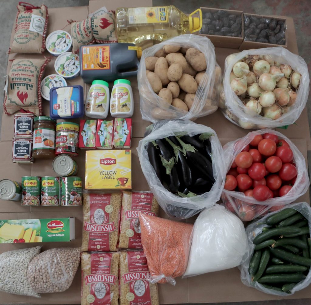 All of the items in one of our Ramadan food parcels arrayed in the style of knolling photography