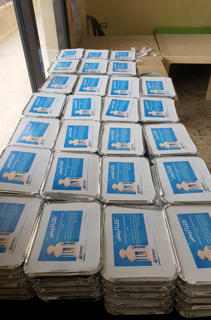 Stacks of our Ramadan hot meals packaged for delivery in Lebanon