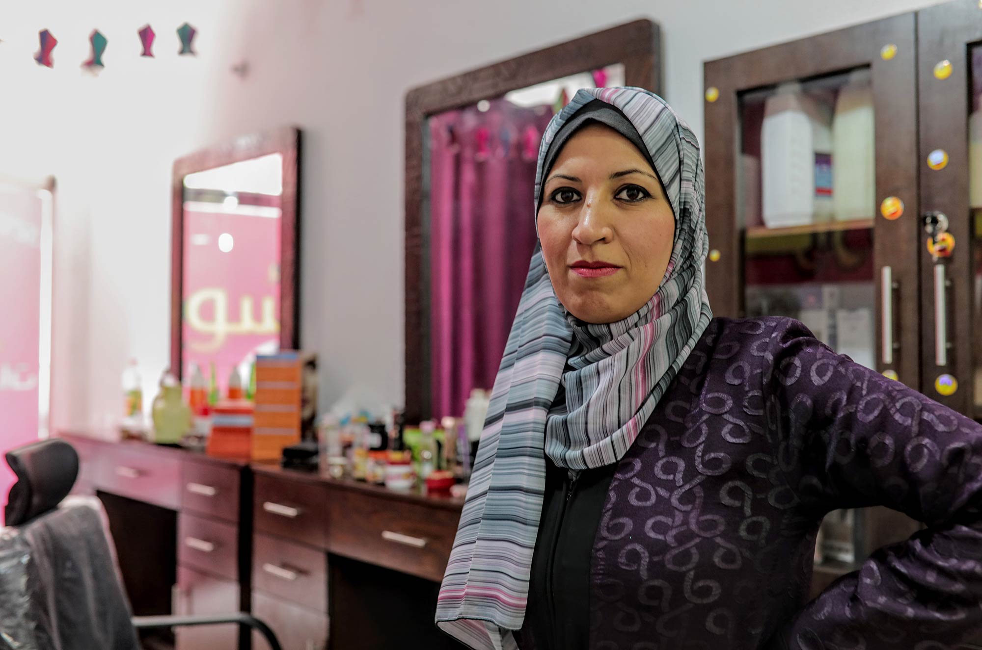 Warda stands in her new salon in Beit Hanoun.