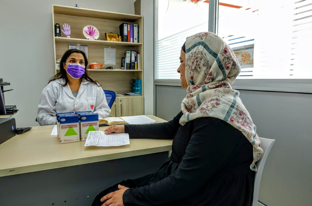 Palestine, West-Bank, medical-delivery, medical-aid, cystic-fibrosis, pharmacist Pharmacist, Abeer Tawil, gives counselling on the effective use of the medicine.