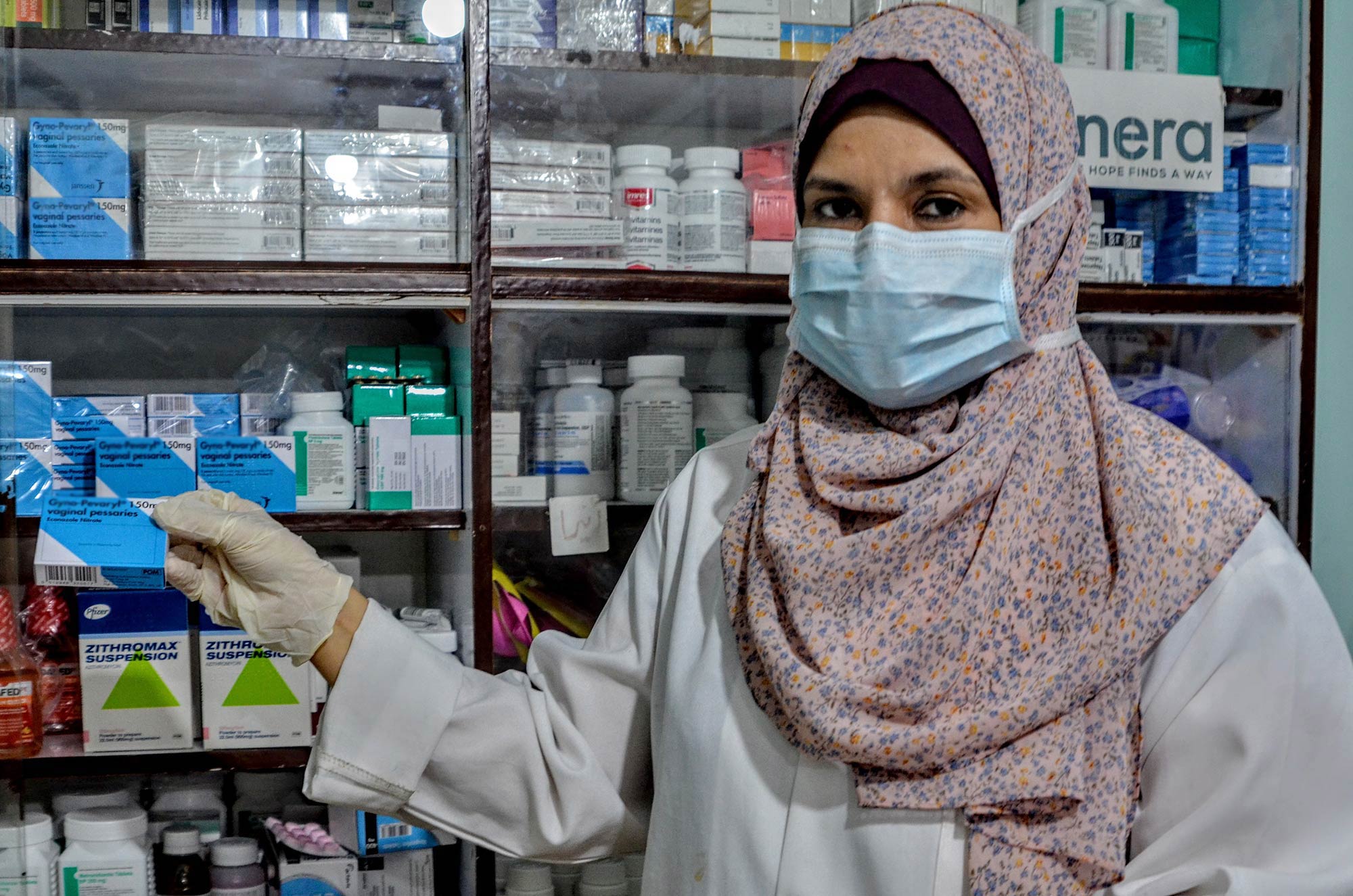 Marwa, a pharmacist at the clinic, sees dozens of patients in a typical day.