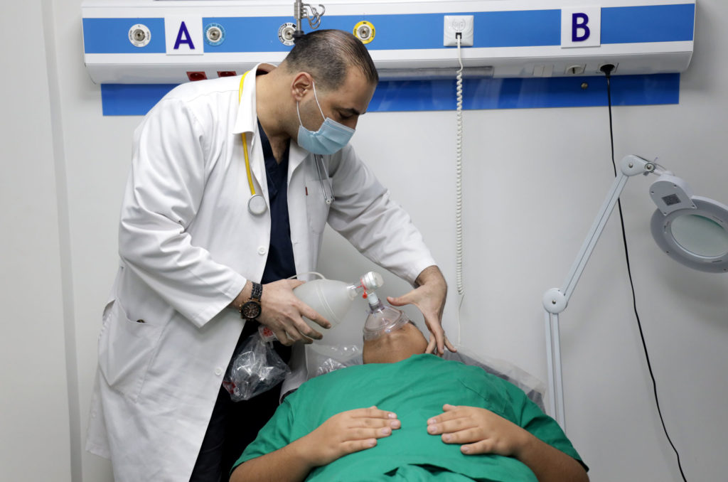 Lebanon, medical-aid, Burj El Barajneh, anesthetic, sevoflurane Anesthesiologist Fady Abdul Razek treats a patient.