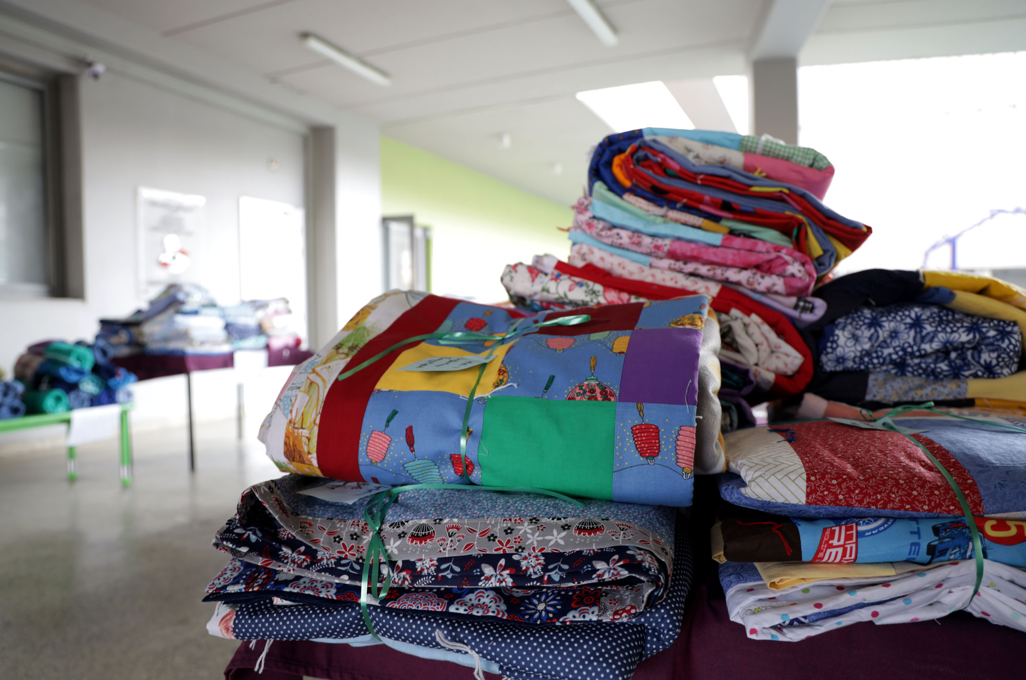 A stack of blankets for distribution at the school.