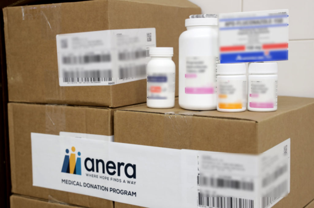 An open box of medicines and medical supplements donated by IHP and distributed by Anera.
