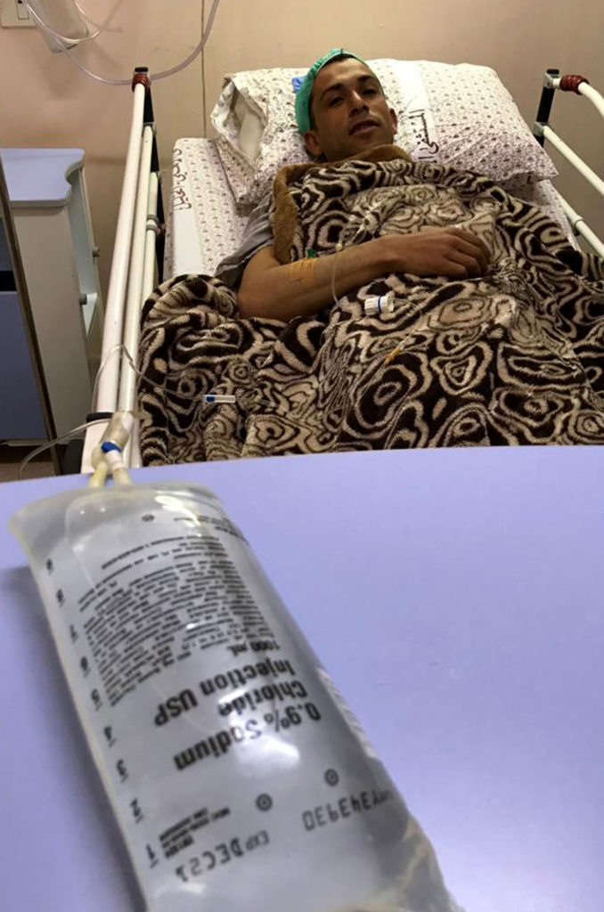 medical-aid, health, al-ahli-hospital, palestinian, hebron, awad Patient Awad with a saline bag.