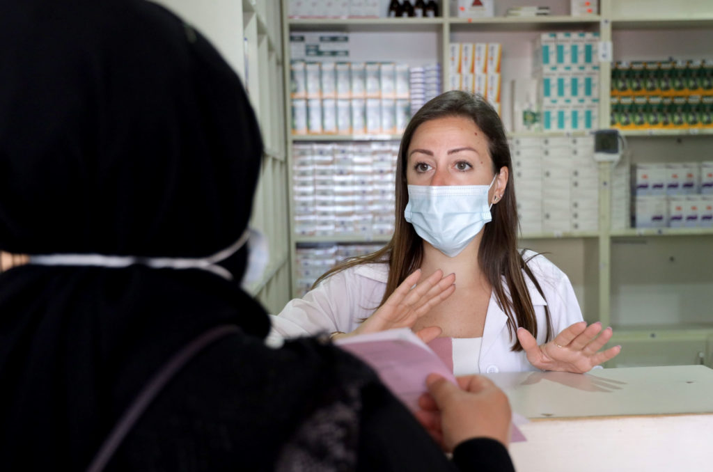 Shrayteh speaking with a patient