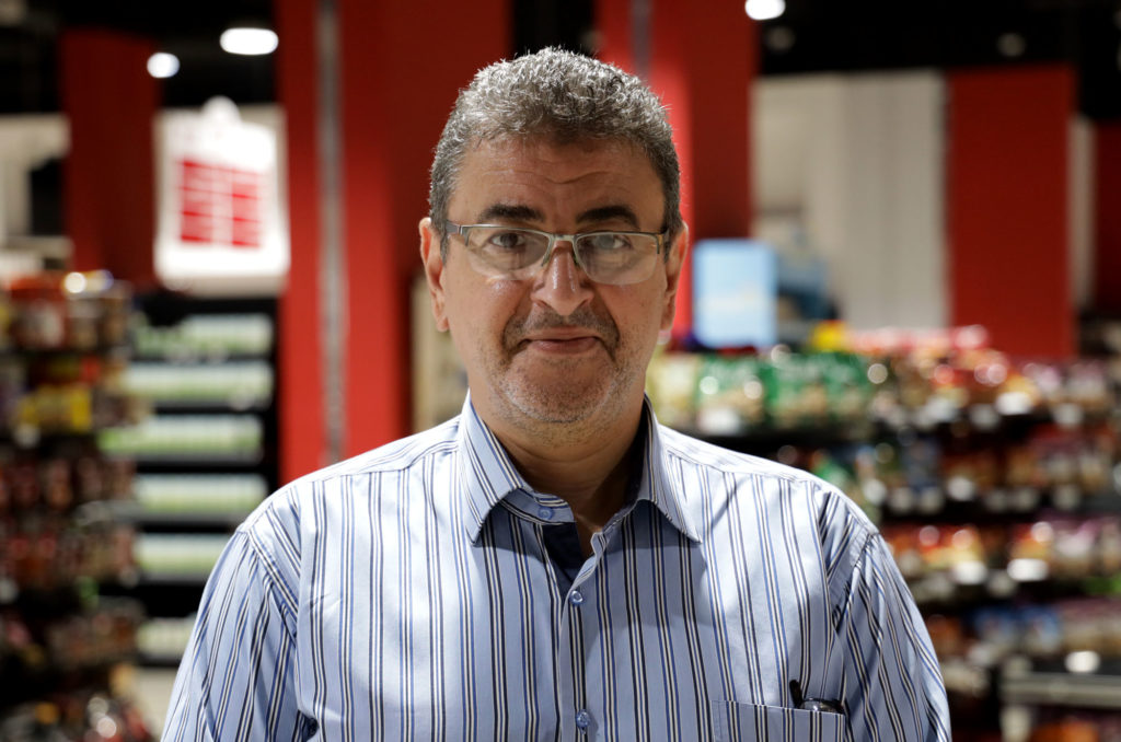 Mohamed Salama inside the Diwan grocery store