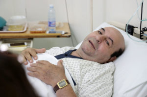 Karam in his hospital bed.