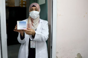 Dr. Talia Dhaher at Shifa Hospital with donated chemotherapy meds