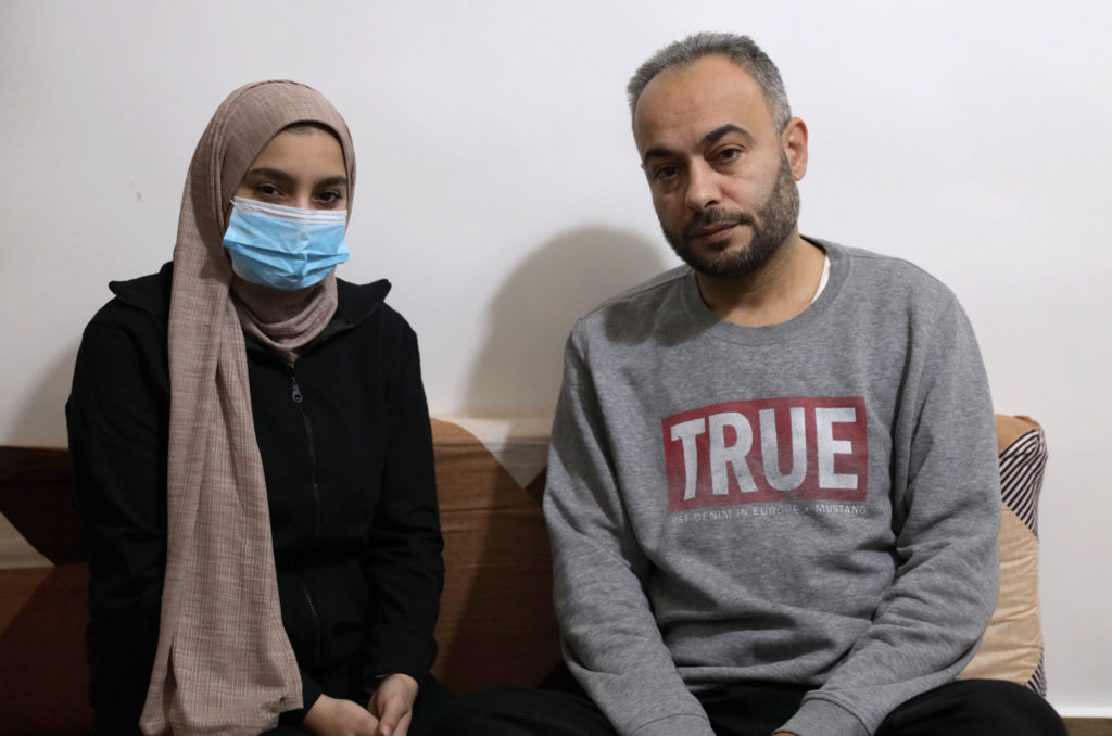 lebanon, palestinian-refugees, covid-19, vaccine, motivational-kits, public-health, wash, nour, EDIT Nour sits at home with a family member.