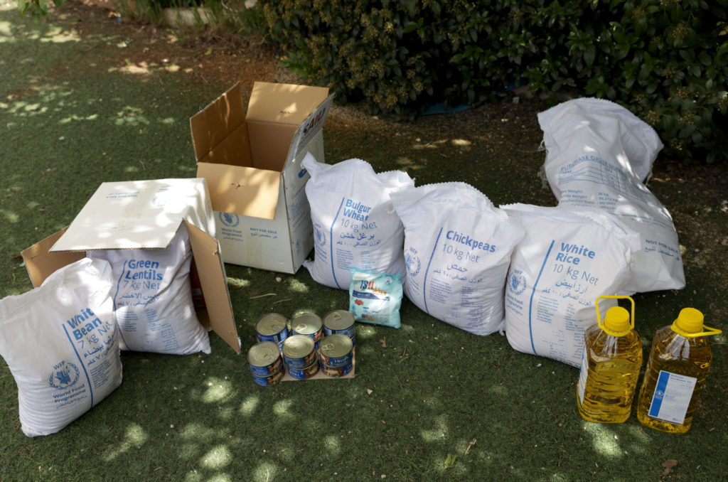 An array of bags of grains and other food staples.