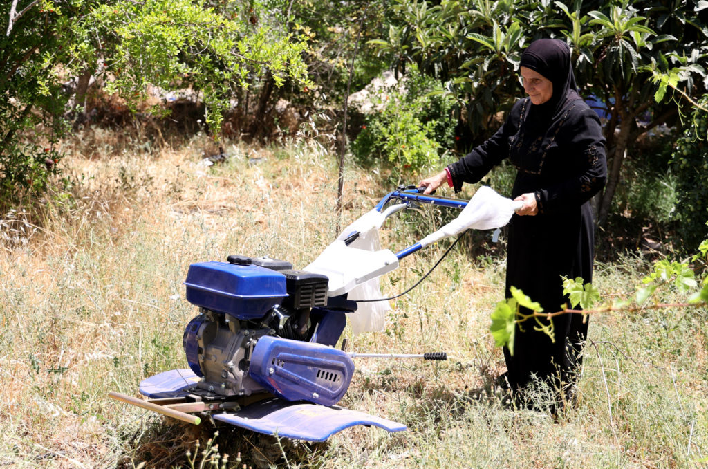 Ameera tries out her new plow