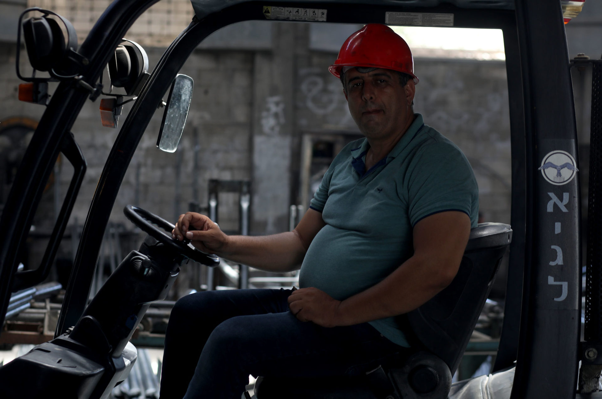 Factory worker in a forklift