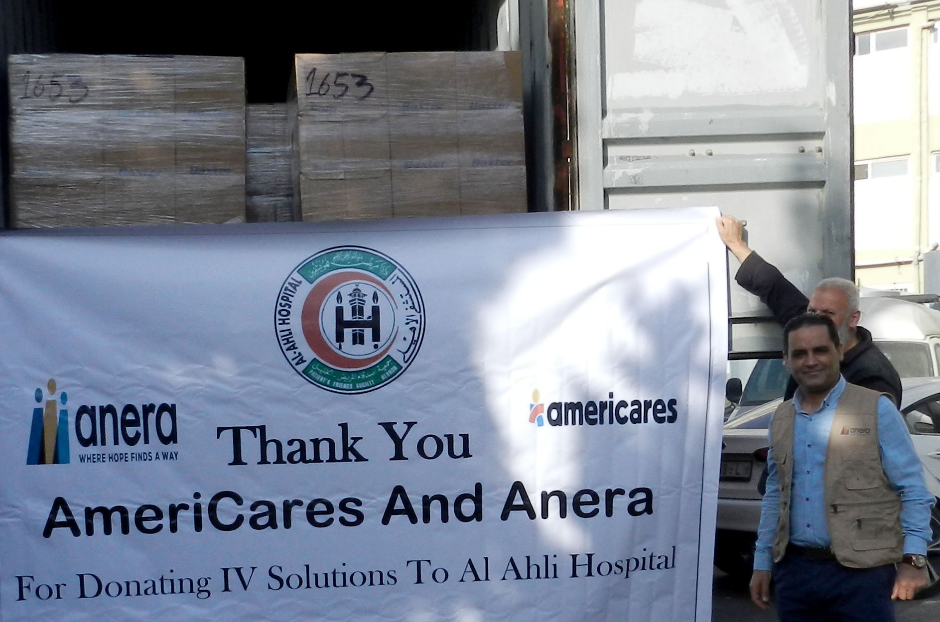 A banner that Al Ahli Hospital in Hebron made to thank Americares and Anera for medical aid donations.