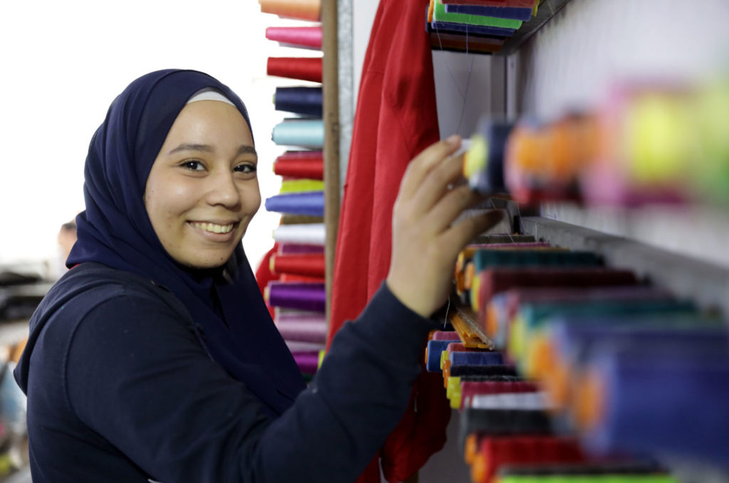 Aya in her sewing factory.