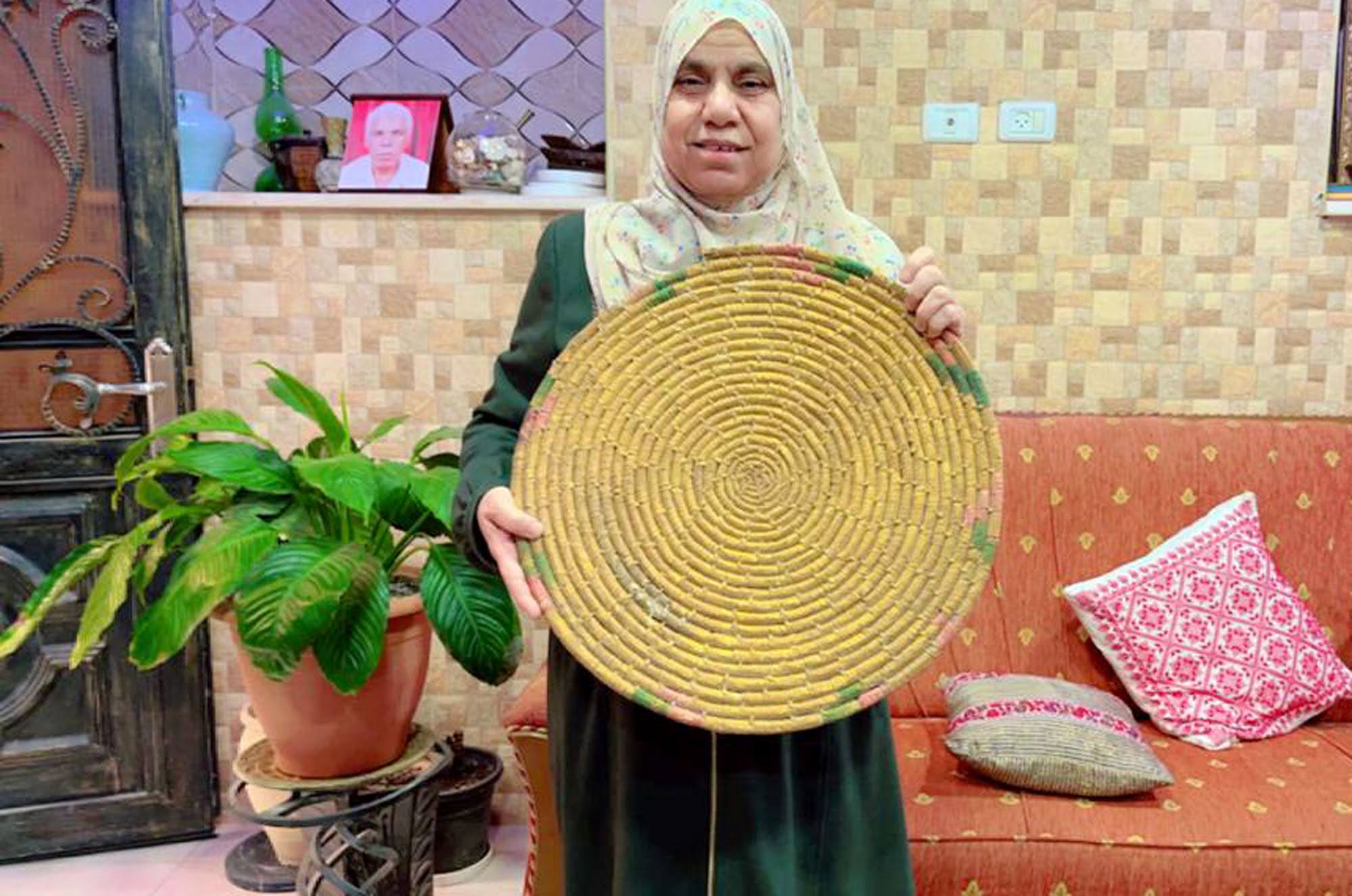 This is Sabah's grandmother's handwoven tray made of wheat straw. This was handmade by her grandmother in the 1940’s  when she was a young girl living in her village before the 1948 war.