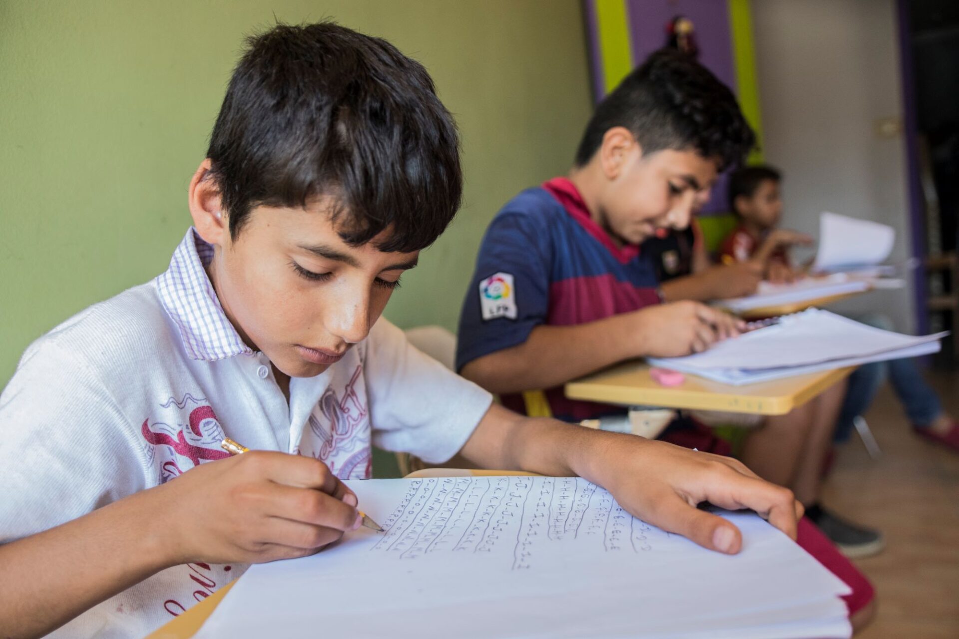 Anera-English-Sessions-Beddawi-Camp-2016 Students studying English in Beddawi refugee camp.
