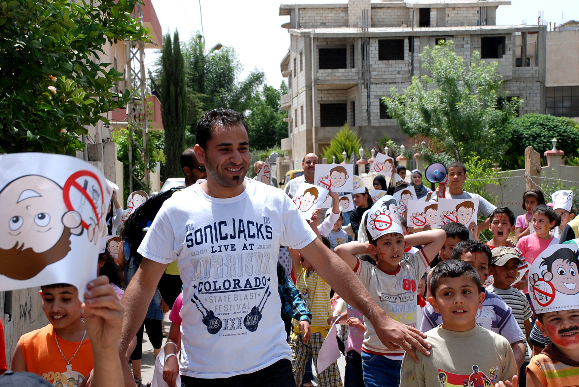 A Creative Health Campaign parade of children from an UNWRA school in Bar Elias, Bekaa. This one, that took place in 2010, focused on smoking cessation.