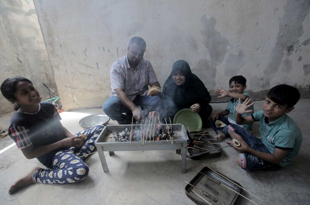 A Gaza family enjoys their Qurbani meat.