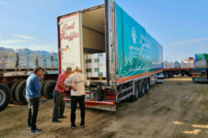 Greeting a WCK truck that has just arrived in Gaza from Egypt