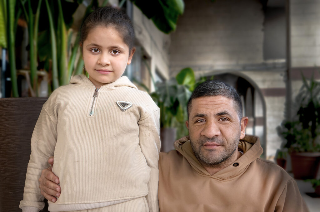 happy and healthy young girl with her father