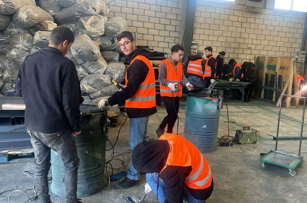 Anera's youth practice their welding skills.