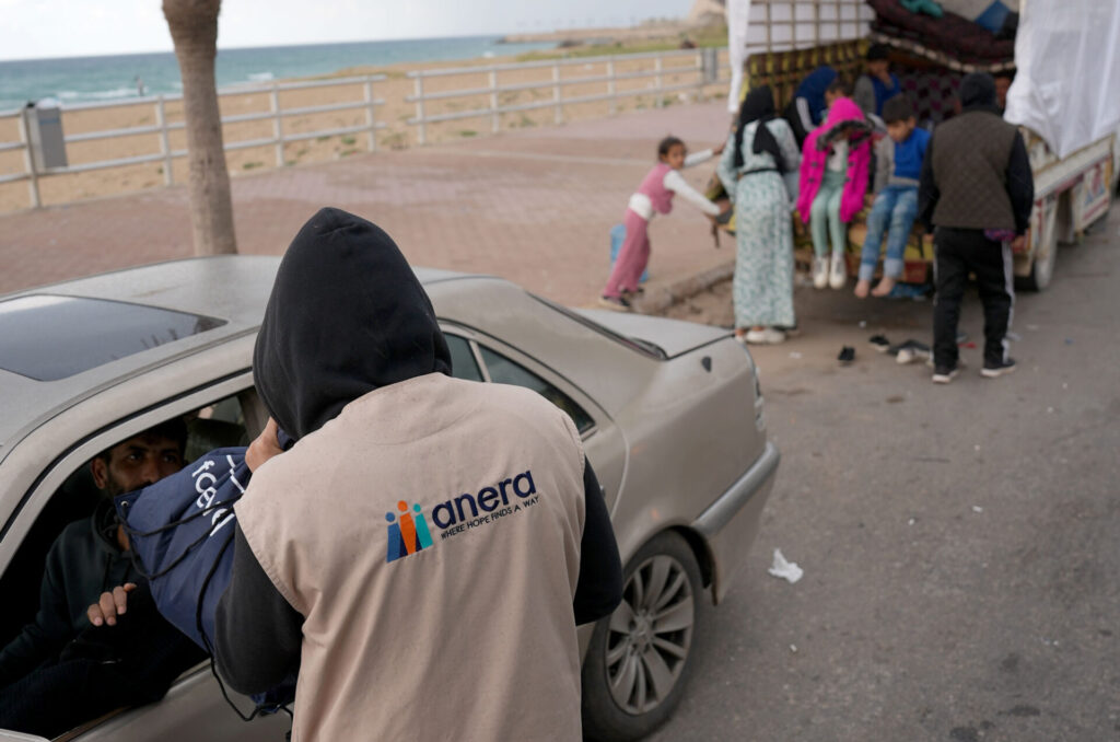 anera employee delivers food